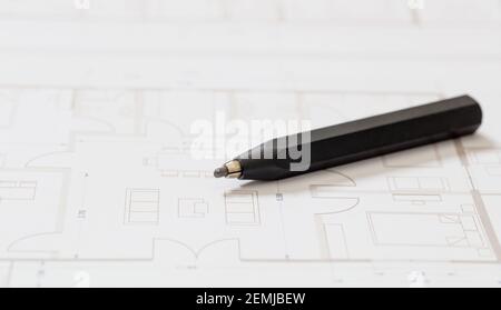 Project blueprints and architect engineer pencil. Real estate, housing project design, construction site concept. Stock Photo