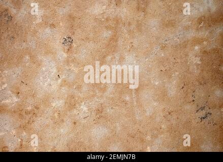 view of the texture of an unpolished beige marble stone or slab Stock Photo