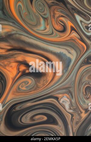 Fluid art with acrylic paint and ink in orange tones, black and gray and blue tones. colorful marble texture floor Stock Photo