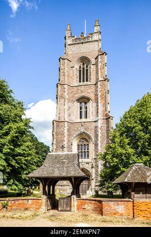 15th century red brick tower of St Marys church in the village of Stoke by Nayland, Suffolk UK - Tower is in a number of paintings by John Constable. Stock Photo