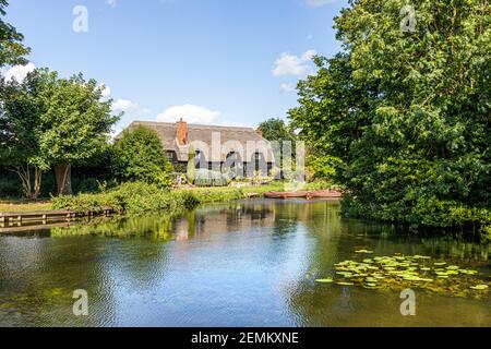Summertime in Constable Country - Flatford Granary beside the River Stour near Flatford Mill, East Bergholt, Suffolk UK Stock Photo