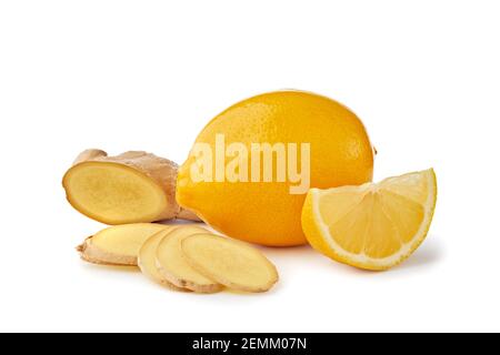 Sliced ginger root and lemon on white Stock Photo