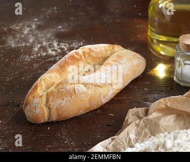 bread on a rustic wooden countertop Stock Photo