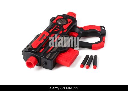 Childrens toy gun and foam bullets isolated on white background Stock Photo