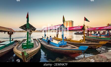 Dubai, UAE, 3 January 2021: View of Dubai Creek. Boats and Abra ferries on the Bay of Creek in Dubai. Famous tourist destination in the UAE Stock Photo