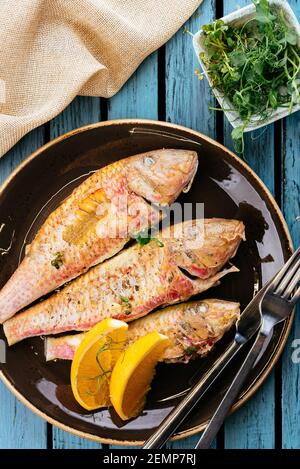 grilled fish with herbs and lemon Stock Photo
