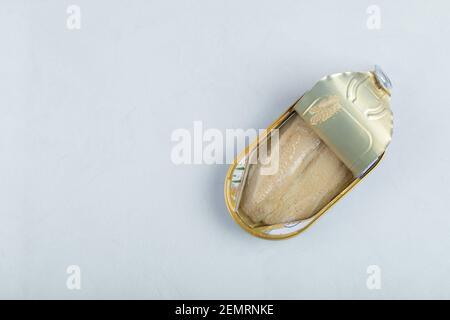 Top view Canned Tuna chunk in can, open canned food with lid cover is opened Stock Photo