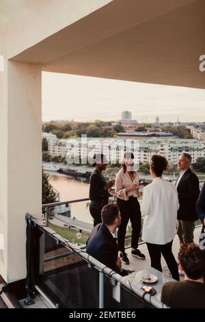 Female and male colleagues during office party Stock Photo