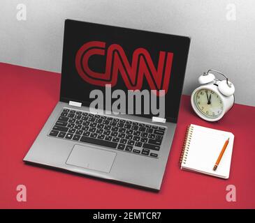 Kharkov, Ukraine - February 24, 2021: CNN news Logo on laptop screen, creative template photo Stock Photo