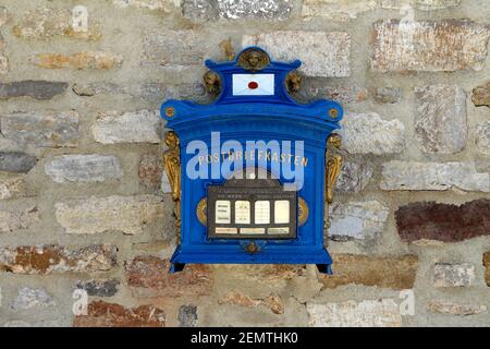Old German blue mail box hanging on the wall in the Petersberg Citadel. Stock Photo
