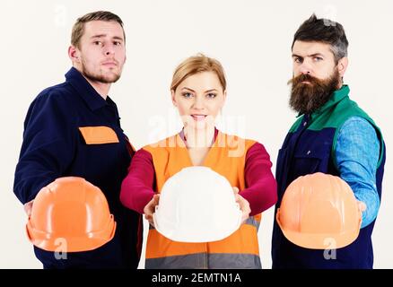 Men in Hard Hats, Uniform and Woman. Team of Architects, Stock