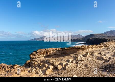 Ocean view on la Pared beach. Beautiful view of the clear sea, waves, cliffs and beach in Playa de la Pared - Canary Islands, Fuerteventura, Spain. Stock Photo