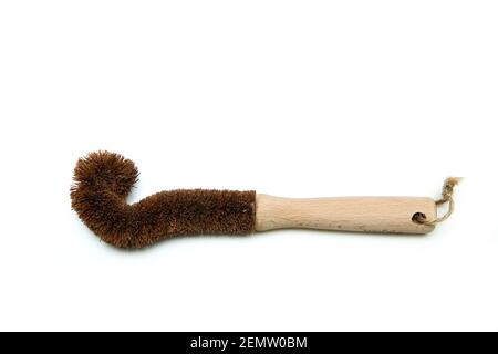A cleaning brush for bottles made from natural materials. Made from wood and natural bristles. Isolated on a white background. Stock Photo