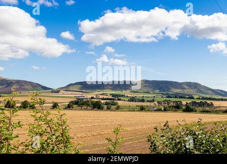 Looking towards Bishop Hill over harvested wheat fields, Fife, Scotland. Stock Photo