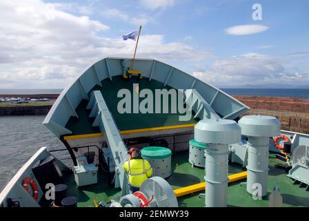 Bow visor on vehicle roro ferry being lowered as vessel leaves Ardrossan harbour, Scotland Stock Photo