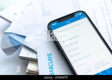 B arclays online mobile phone app and  bank documents Stock Photo