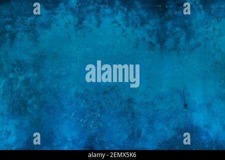 Blue background from Venetian plaster with imitation of marble texture. Blue wall in the interior with the texture of natural marble surfaces applied Stock Photo