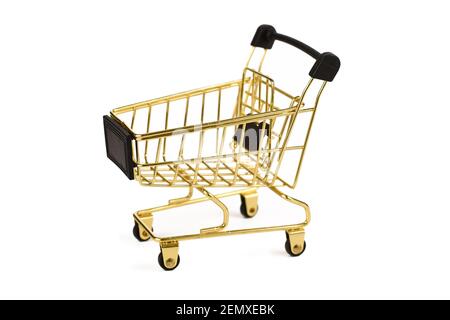Golden empty shopping cart isolated on white background Stock Photo