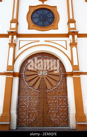 Detail of main entrance of cathedral of Santiago the Apostle, Santiago, Veraguas Province, Panama. The letters JHS stand for Jesus Stock Photo