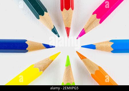Different coloured colouring pencils arranged in a circle Stock Photo