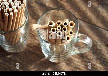 Bamboo and paper straws for drinks - zero waste or ecological lifestyle concept Stock Photo