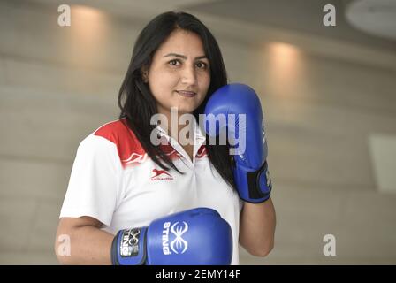 New Delhi, India - April 29, 2019: Pooja Rani, who won a gold medal in the  81 kg category at Asian Boxing Championships held at Bangkok, poses for a  picture during a