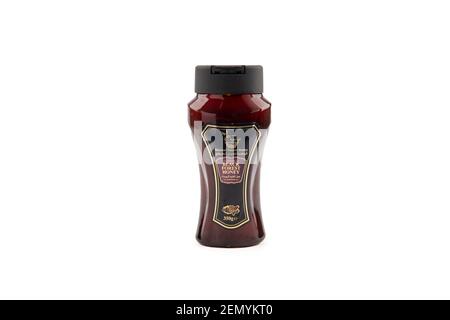 Black Forest Honey Bottle on isolated background Stock Photo