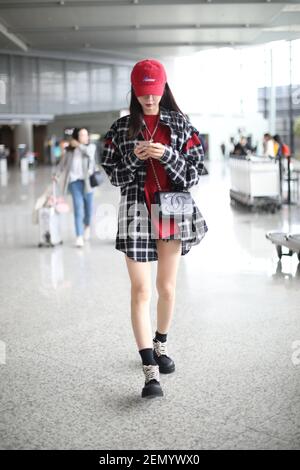 Chinese TV hostess and actress Shen Mengchen arrives at the Beijing ...
