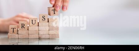 Trust And Loyalty Management Letter Stack In Office Stock Photo