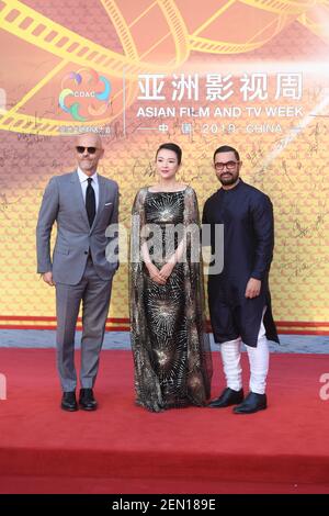 Chinese actress Zhang Ziyi, center, and Indian actor Aamir Khan, right, pose as they arrive on the red carpet for the launch ceremony of Asian Film and TV Week during the Conference on Dialogue of Asian Civilizations (CDAC) in Beijing, China, 16 May 2019. (Photo by Cao ji - Imaginechina/Sipa USA)