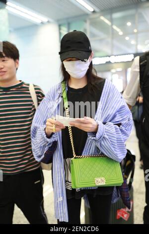 Chinese actress Guan Xiaotong arrives at the Beijing Capital ...