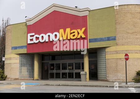 A logo sign outside of a EconoMax retail store location in Montreal ...