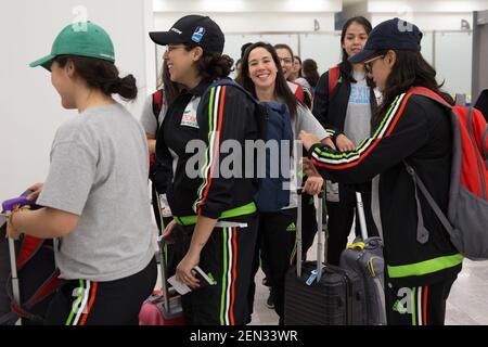 The whole team (players and coaches) of the Selección femenil de México de hockey sobre hielo, along with their families, meet at the departure gate of the Benito Juárez International Airport in Mexico City, Mexico on March 30, 2019. The team is traveling to Scotland to compete in the 2019 IIHF Women's World Championship Division II Group A. Founded in 2012, the Selección femenil de México de hockey sobre hielo is the first and only women’s national ice hockey team in Mexico, a country where ice rinks are expensive and rare. In the 2017 IIHF Women's World Championship Division II in Iceland, t