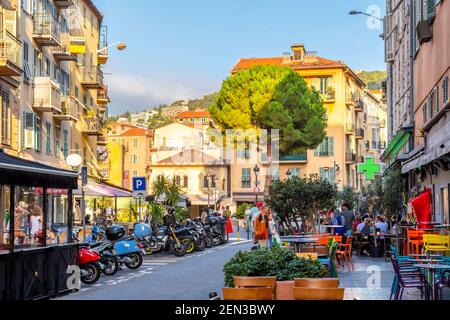 Cafes and shops fill the crowded historic center of Old Town Vieux Nice on the French Riviera in Nice, France. Stock Photo