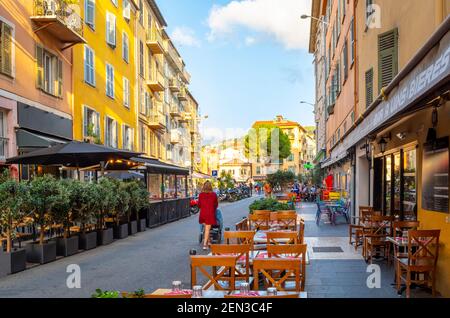 Cafes and shops fill the crowded historic center of Old Town Vieux Nice on the French Riviera in Nice, France. Stock Photo