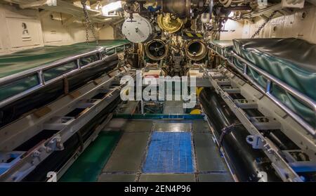 Forward torpedo Room with Torpedo and torpedo tubes on World War II submarine USS Pampanito in San Francisco, California, USA Stock Photo