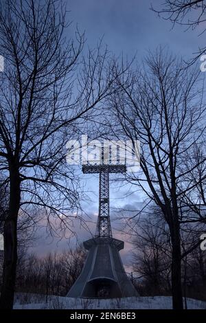 Montreal Mont-Royal Cross during snow storm Stock Photo