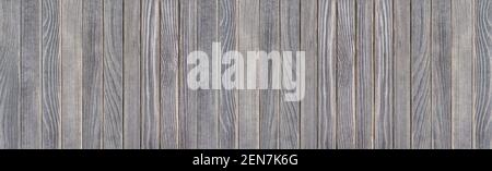 Blue-gray wooden wall made of vertical boards Stock Photo