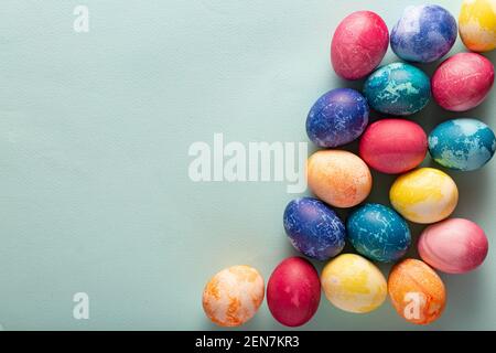 Painted Easter eggs on a blue background Stock Photo