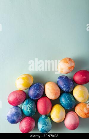 Painted Easter eggs on a blue background Stock Photo