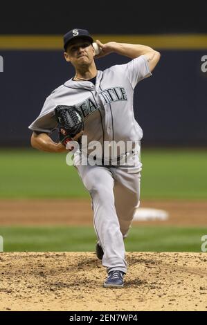 Seattle Mariners pitcher Marco Gonzales poses for a photo as he wears a  club T-shirt with Believe across the front before a baseball game against  the Los Angeles Angels, Sunday, Oct. 3