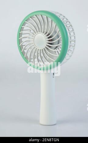 Rechargeable portable mini fan isolated on white background Stock Photo