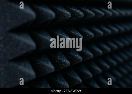 sound absorbing material on the wall close up as a dark geometric abstract background Stock Photo