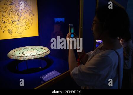 A visitor views treasures and relics from Afghan national treasures during an exhibition at a museum in Nanjing city, east China's Jiangsu province, 8 July 2019. An exhibition displayed a total of 231 pieces of the national treasures and relics from Afghan national treasures. China is holding a rich variety of exhibitions and activities on the culture of Asian countries and regions as well as exchanges among them. (Photo by Su yang - Imaginechina/Sipa USA)