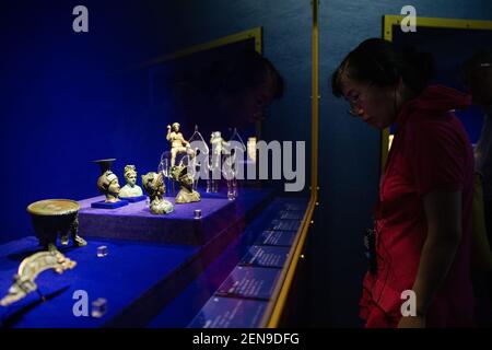 A visitor views treasures and relics from Afghan national treasures during an exhibition at a museum in Nanjing city, east China's Jiangsu province, 8 July 2019. An exhibition displayed a total of 231 pieces of the national treasures and relics from Afghan national treasures. China is holding a rich variety of exhibitions and activities on the culture of Asian countries and regions as well as exchanges among them. (Photo by Su yang - Imaginechina/Sipa USA)