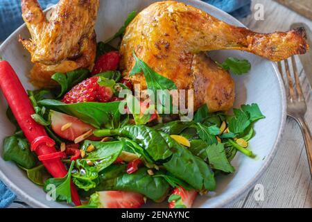 healthy chicken dish with delicious salad served on a plate Stock Photo