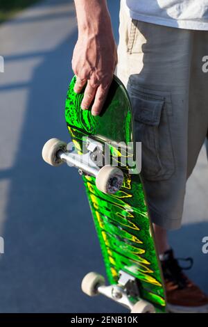 Middle aged skate boarders in Clissold Park Hackney skate park Stock Photo