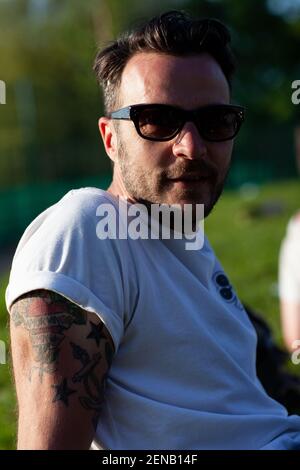 Middle aged skate boarders in Clissold Park Hackney skate park Stock Photo