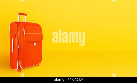 Orange suitcase, baggage, luggage, trolley bag closeup bright yellow background, travel banner, summer holidays design, vacation concept, tourism Stock Photo
