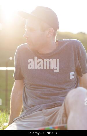 Middle aged skate boarders in Clissold Park Hackney skate park Stock Photo